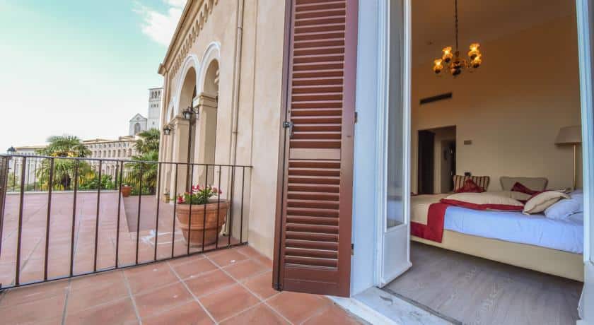 Hotel Subasio Assisi, Italy, view of the bedroom from the outside balcony, side view of the church in the distance