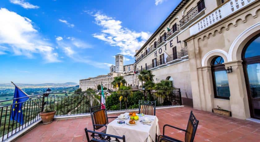 Hotel Subasio Assisi, Italy, balcony view of the table setting, hotel, church and view from the top of the hill