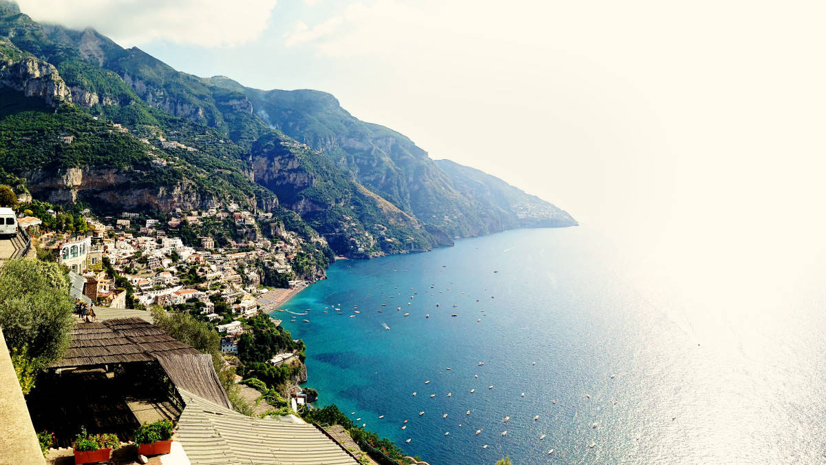 Positano, Amalfi Coast, Italy, view from the top over the coastline, houses, water, mountains