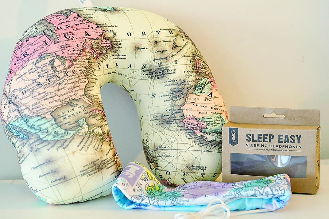 Neck Pillow with a world map print and Headphones 