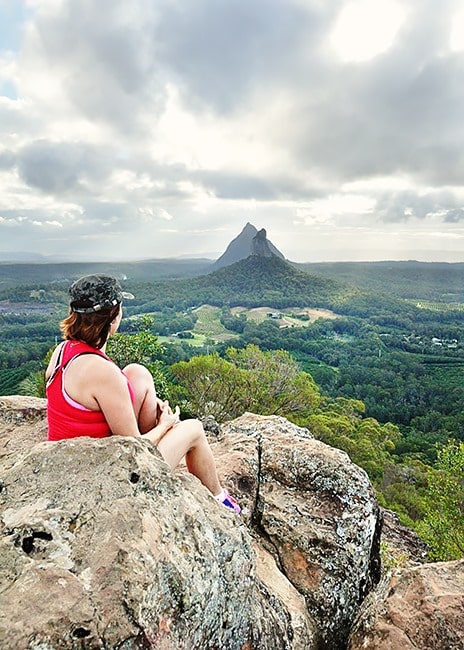 Woman at the lookout, viewpoint in Glasshouse Mountains, Queensland, Australia