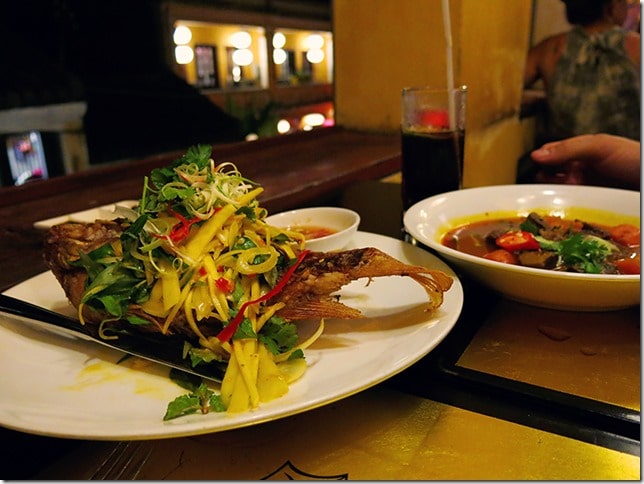 Hoi An Vietnam, Vietnamese food on the table, served on the plates, salad, fish and soup