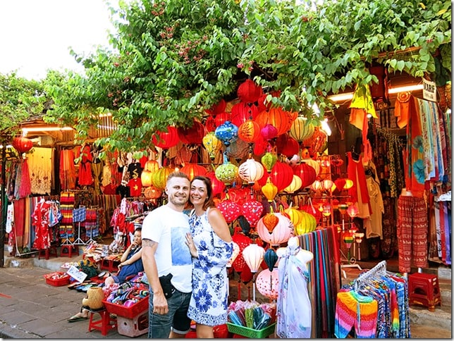 City of Lanterns Hoi An -Hoi An Vietnam, lantern markets, red and yellow colours, man and woman smiling
