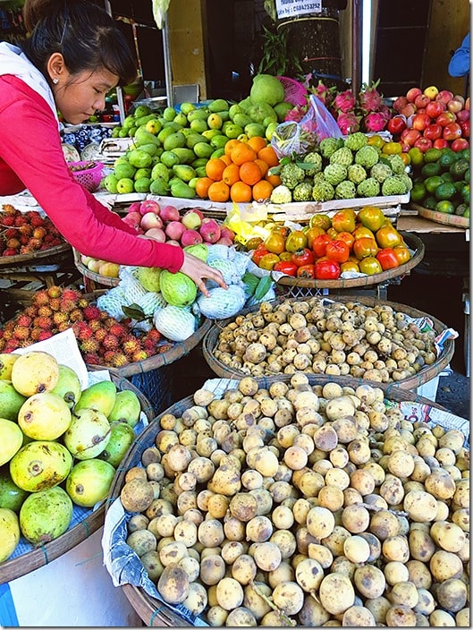 Hoi An Vietnam,  shop lady at the fruit and vegetable market in Hoi An, 