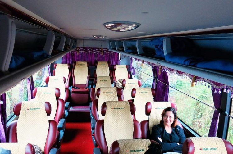 Bus from Hanoi to Sapa, woman sitting in the bus seat, 