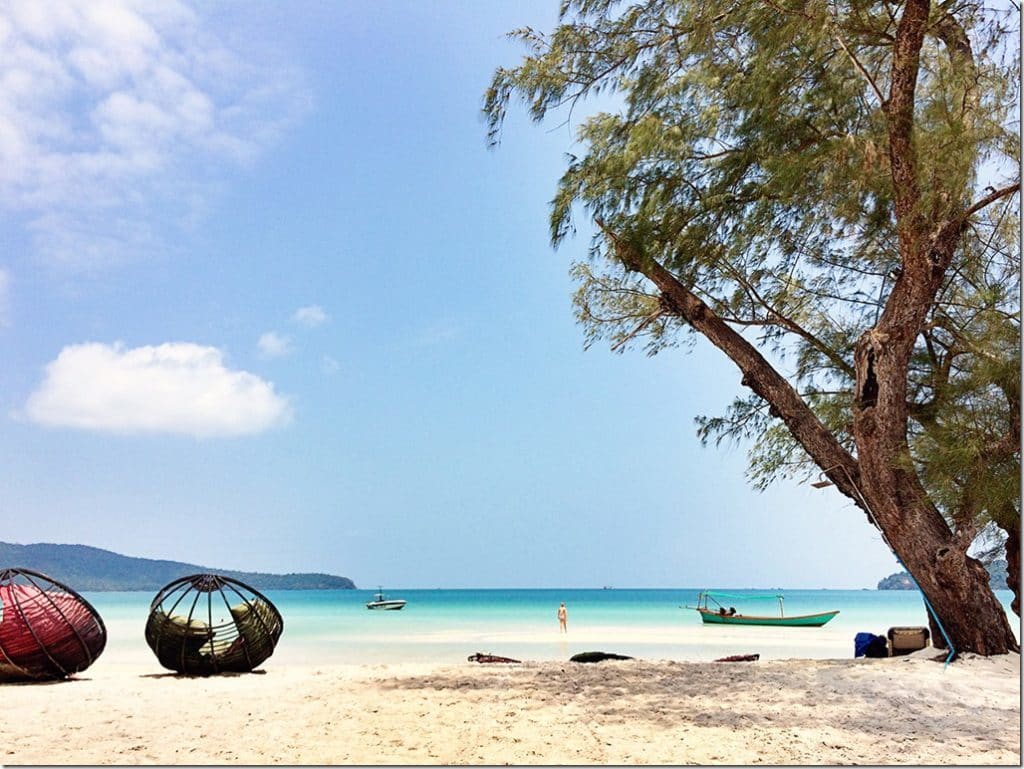 Cambodia beach with seats and blue water
