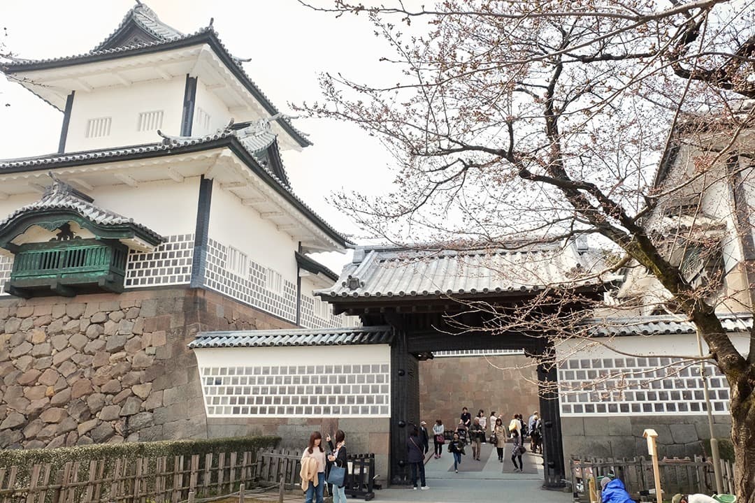 Kanazawa Castle Park in Japan, view of the entrance to the castle, people walking