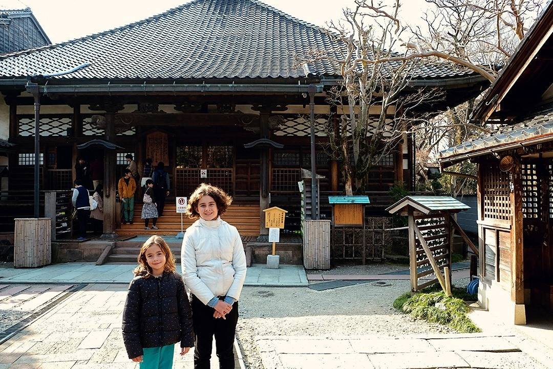 Myo-Ryu-Ji Ninja Temple Kanazawa, Japan, two kids standing in front of the temple