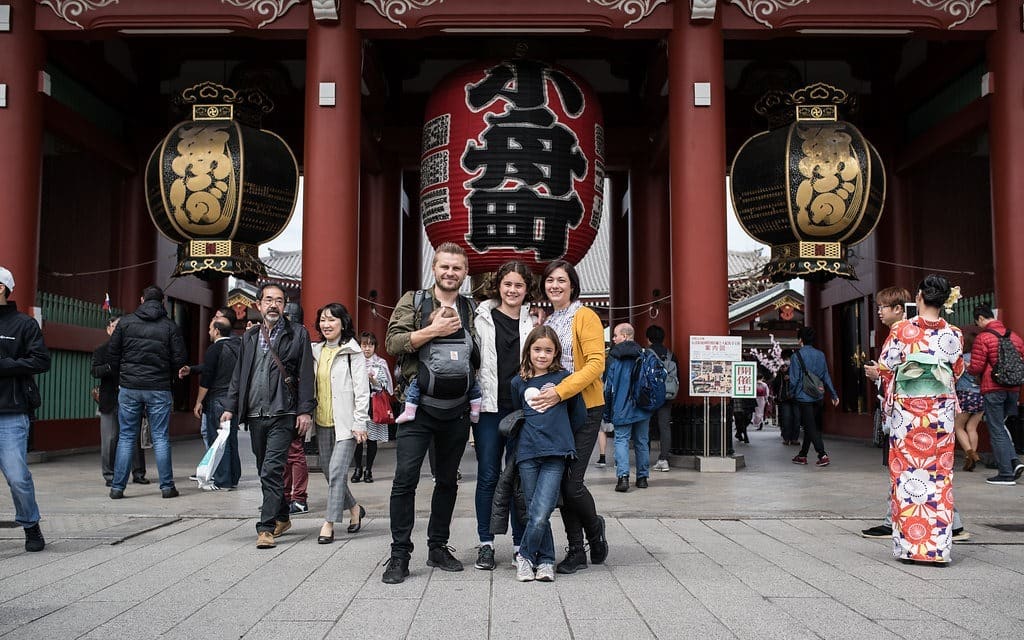 Senso-ji Temple Tokyo, family posing in front of the temple, tourists, kimono lady 