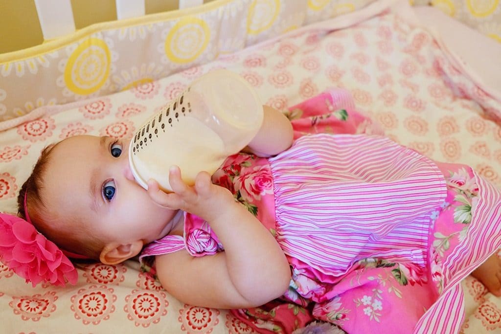 Avalee drinking a bottle