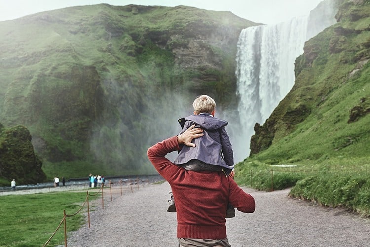 family in vacation traveling in Iceland