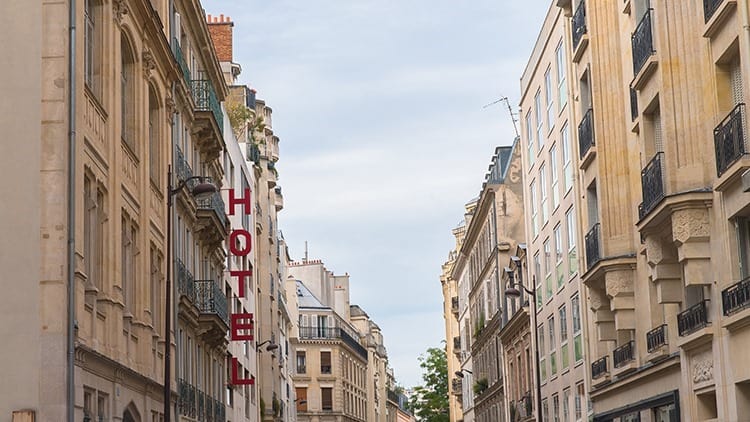 Paris, typical street with the hotel panel, big letters 