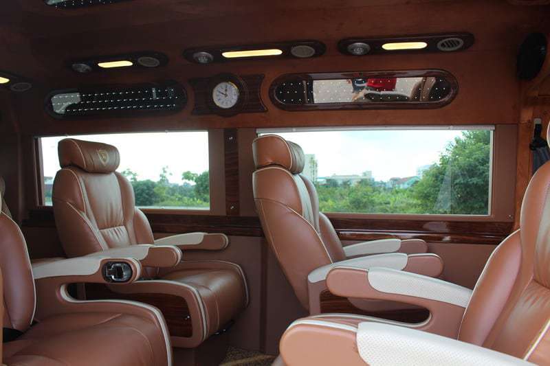 Seats and interior of a luxury bus, brown leather