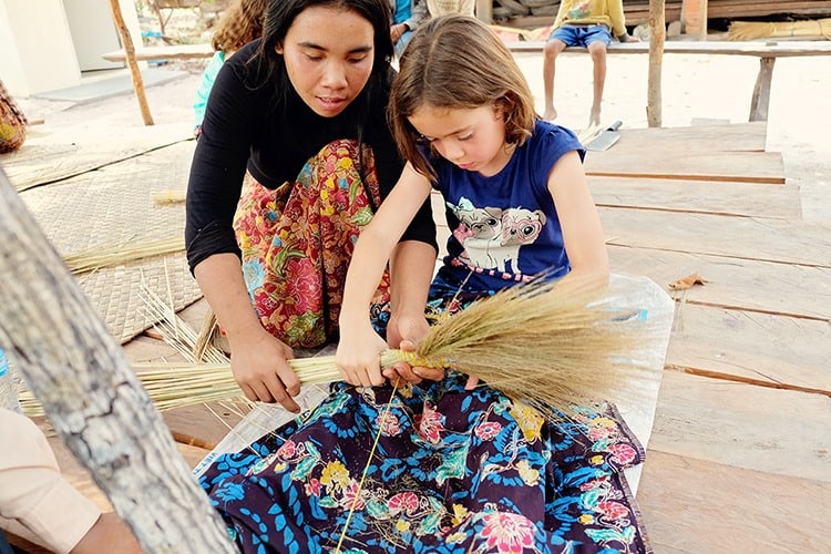 Kids on cultural immersion experience when traveling