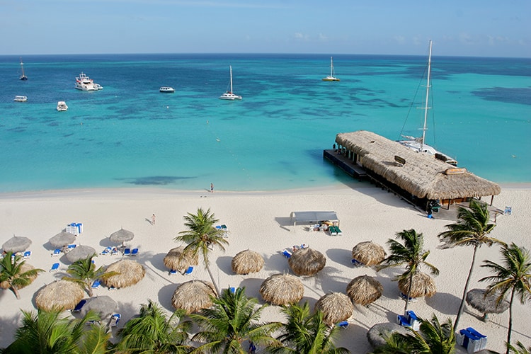 best christmas holiday destinations for families to Playa Palm Beach Aruba
