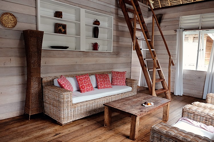Telunas Private Island, Indonesia, view inside the villa of the lounge room area, steep stairs to upper level
