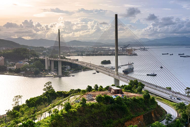 Bai Chay Bridge, Halong Bay, Vietnam, photo of a bridge from above, boats