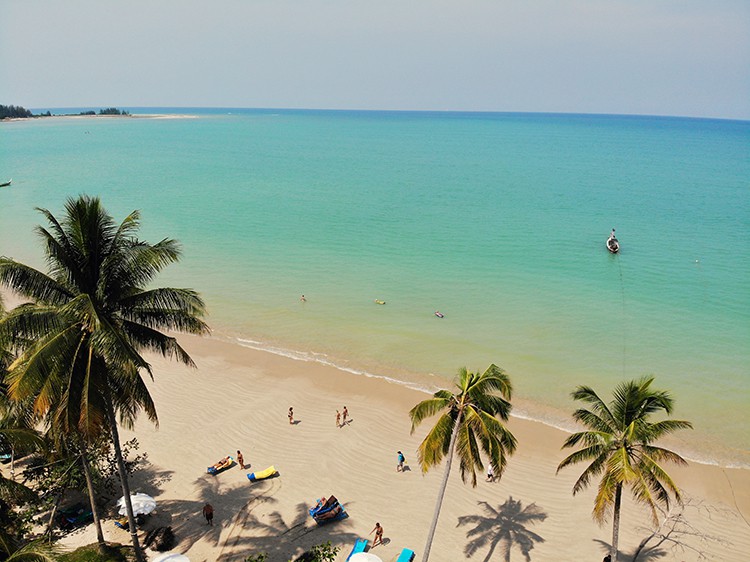 Best Khao Lak Beach - Coconut Beach, Thailand, view of the beach from the top, palm trees, people in the water and on the beach