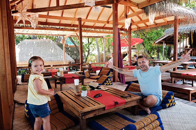 Best places to eat on Koh Lipe Thailand, father and daughter in a restaurant, Castaways, 