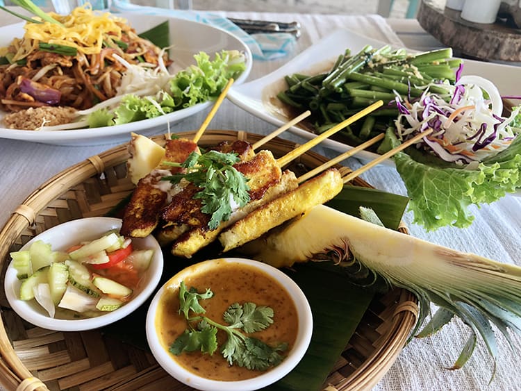 Food on Koh Yao Noi Island, salads, morning glory, satay chicken