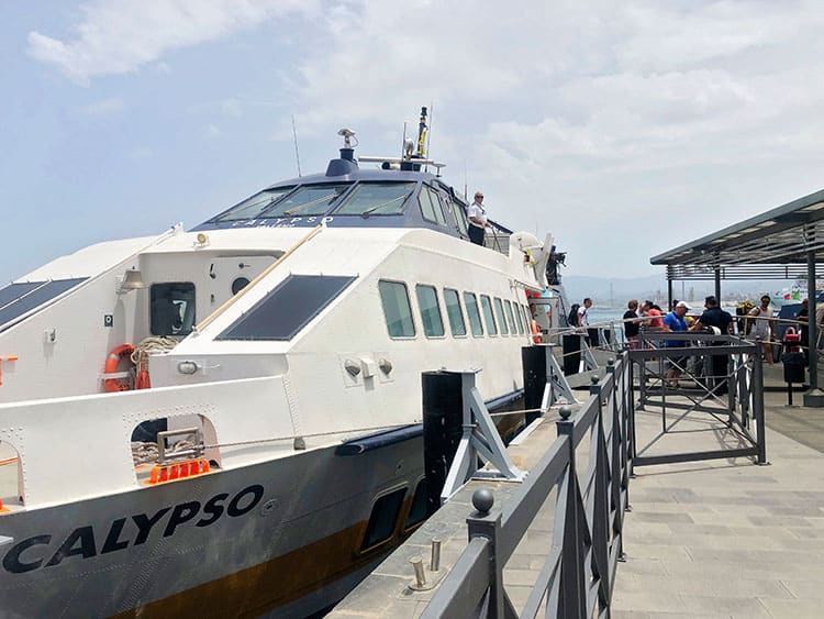 Ferry Calypso, Italy, people departing the boat onto the pier