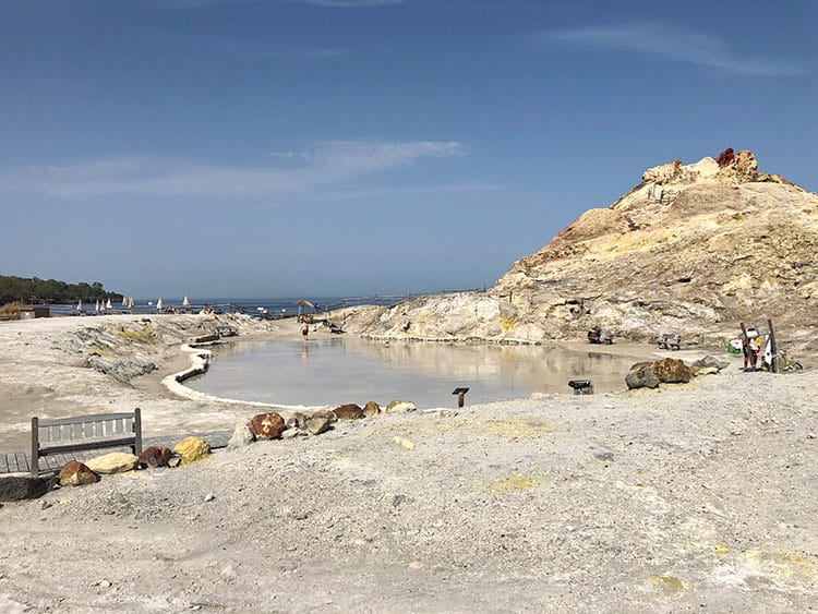 Mud Baths on Vulcano Island, Italy, mud pool surrounded by rocky grey land