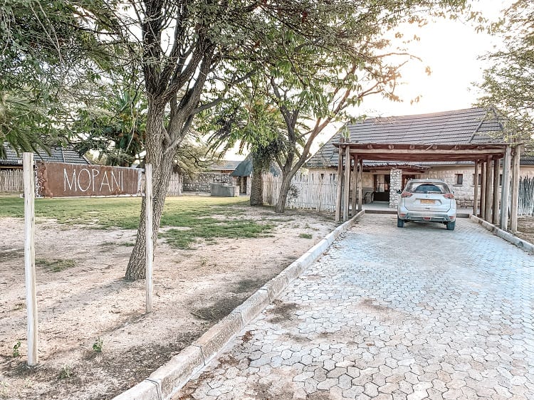 Where to Stay in Etosha with Kids, accommodation in Etosha national park, car parked in front of the villa