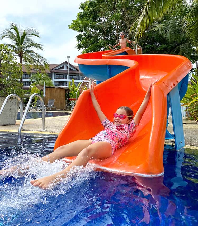 Sunwing Kamala Beach - daughter sliding down the pool slide