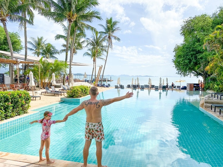 The Village Coconut Island Resort Review - Father and Daughter by the pool