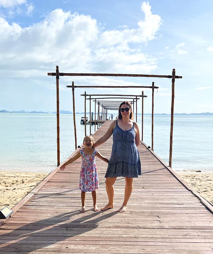 The Village Coconut Island Resort Review - mother and daughter on the wooded pier