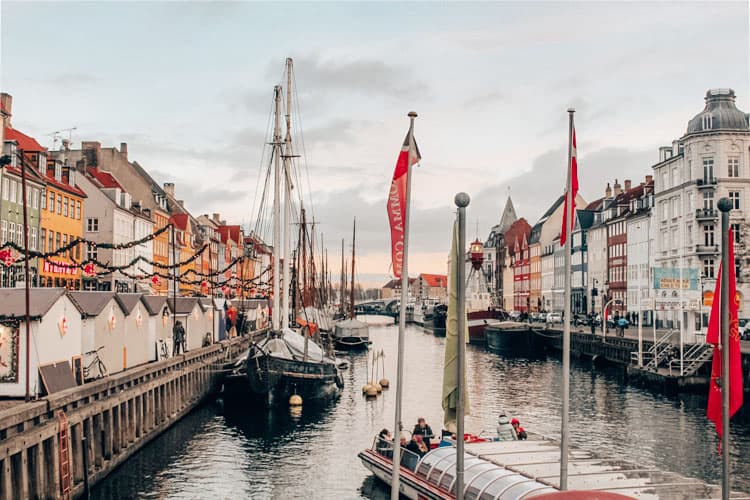 Copenhagen, Denmark, boats on the river, buildings, people