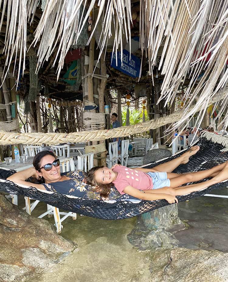 Koh Raham Restaurant, mother and daughter relaxing on the hammock