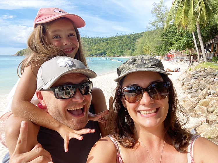 Salad Beach in Koh Phangan, family on the beach wearing hats