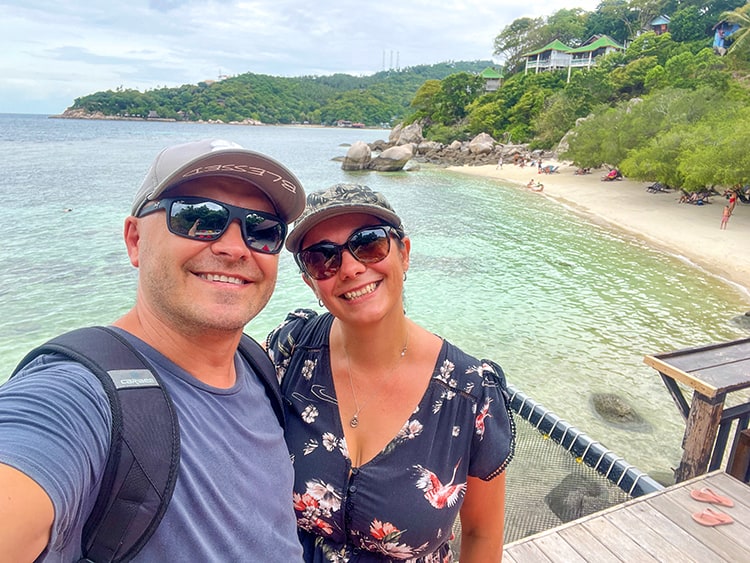 Best Beaches on Koh Tao Thailand - Freedom Beach, couple with the beach in the background