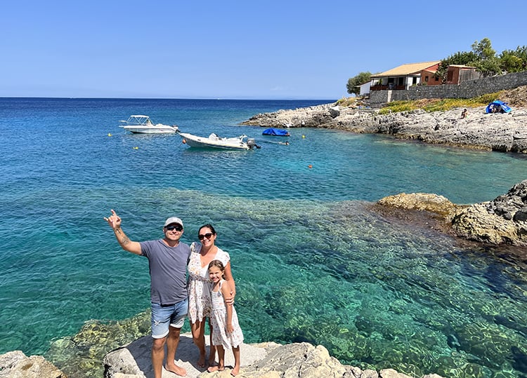 Things to do in Zakynthos Greece - family at the rocky beach