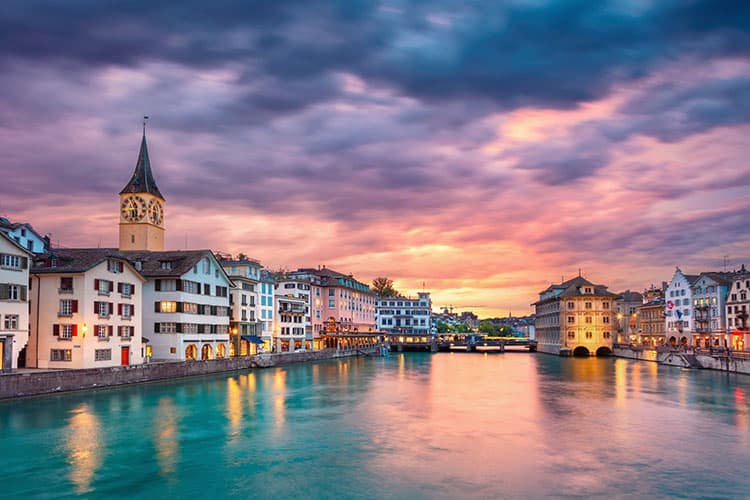 Zurich Switzerland, Sunset view of the buildings near the water's edge