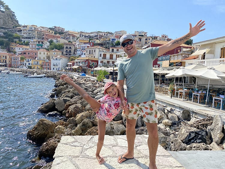 Parga Travel Guide - father and daughter and Parga town in background