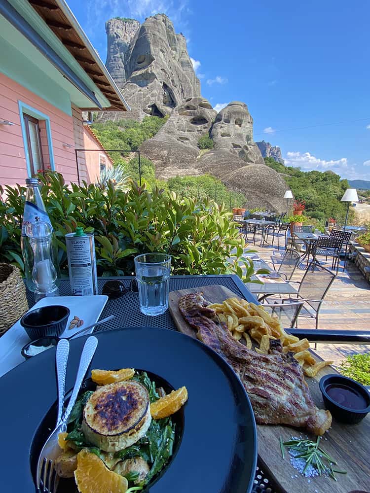 Restaurant at Meteora, view of the food and rock in background