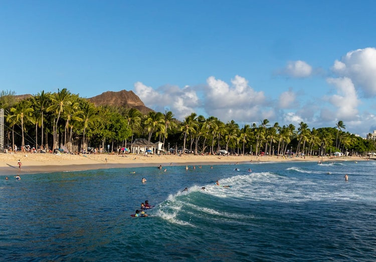 Surfing Oahu Beach Hawaii with toddlers Uprooted Traveler