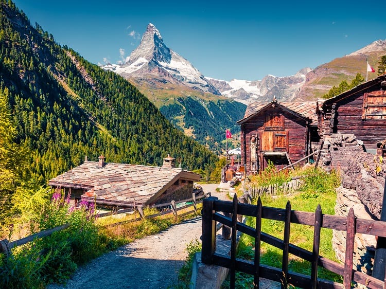 Sunny summer morning in Zermatt village with Matterhorn