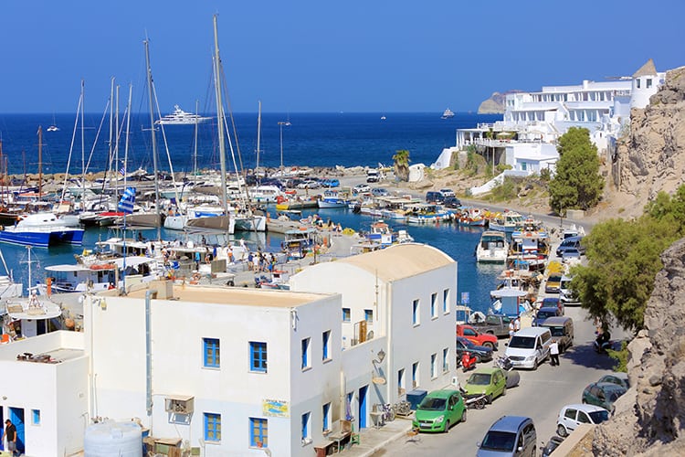 Vlychada Marina in Santorini Greece, view from the top, buildings and boats on the water