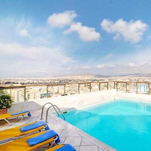 Dorian Inn Athens, Greece, roof top pool with views of the city, square image