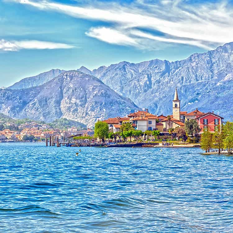 Isola Dei Pescatori Island on the beautiful Lake Lago Maggiore in the background of the Alps mountains, Stresa, Italy