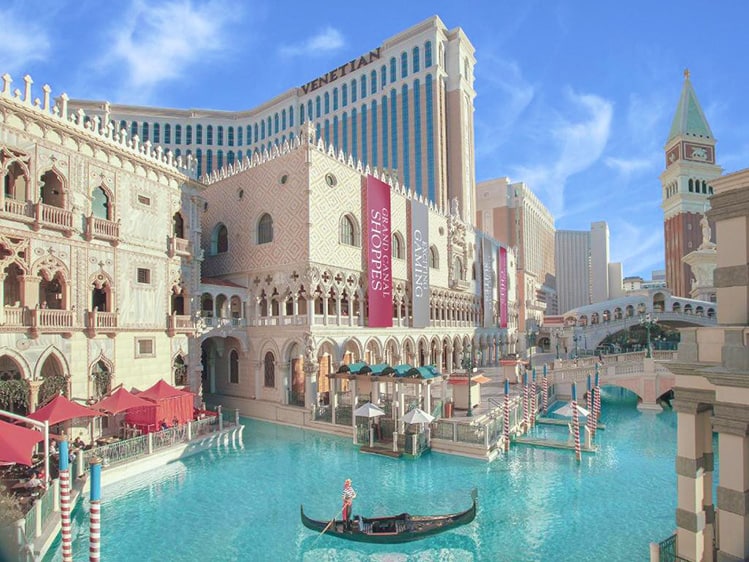 The Venetian, best family-friendly hotels in Las Vegas, gondola on the canal, restaurants and resort view