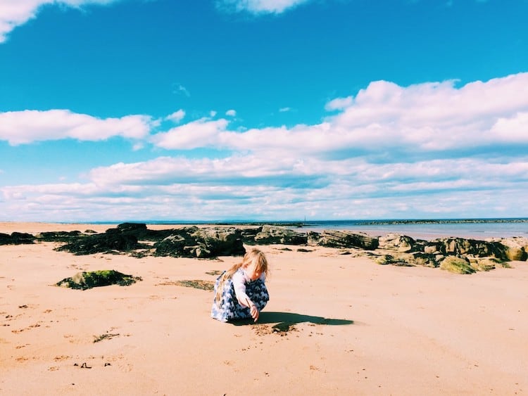 Girl on Kingsbarns Beach in Fife-Scotland Global Mouse Travels