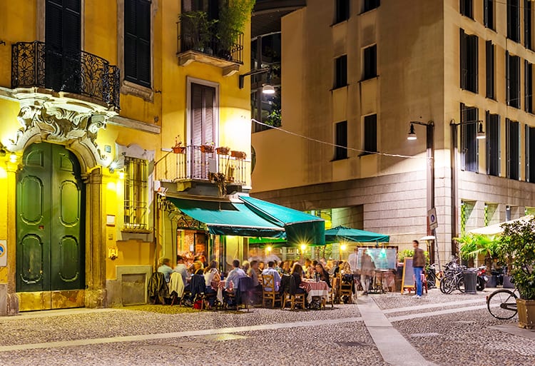 Restaurant in Milan at night, old town Milan, Italy