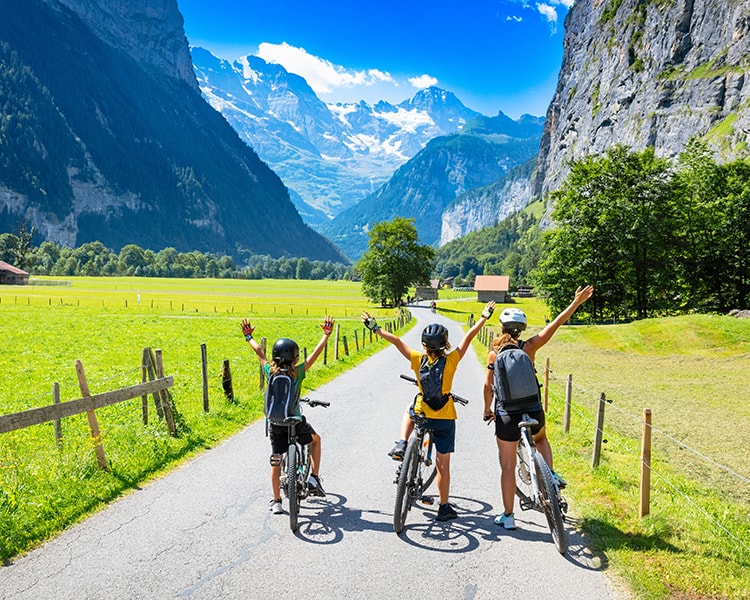 family on bike in Switzerland- Lauterbrunnen