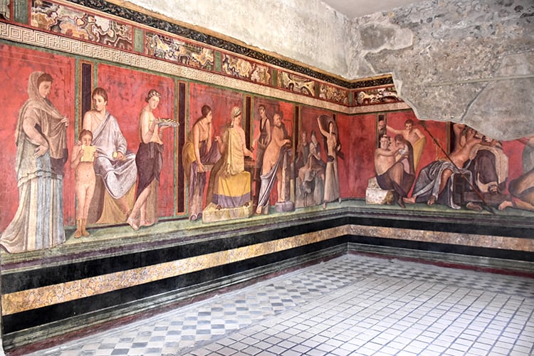 Best Pompeii Day Trips from Rome, inside a building painting on the walls