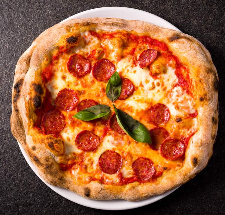 pizza diavola with spicy salami, mozzarella, tomato and basil