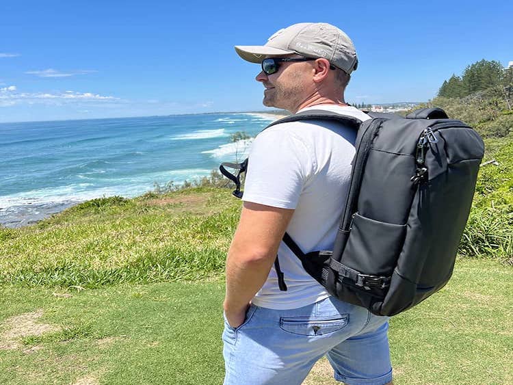 man walking whilst combining family friendly leisure and business travel